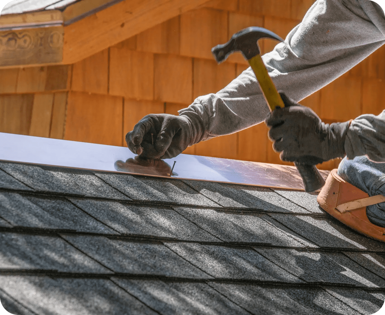 Roofing professional securing shingles